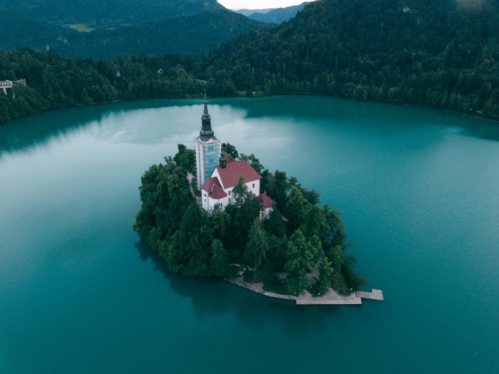 aerial-view-photography-of-cathedral-03yfwdphv40 Above Bled lake in Slovenia